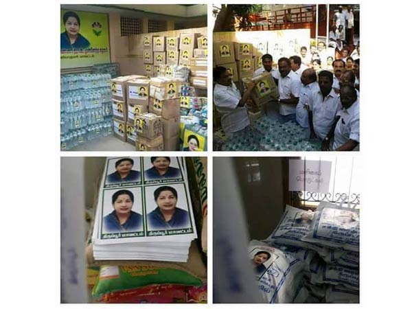 ADMK workers busy with sticking Amma stickers in Flood relief materials ADMK workers busy with sticking Amma stickers in Flood relief materials