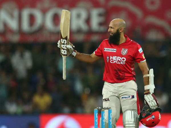 Hashim Amla celebrates reaching his century against Mumbai. Hashim Amla celebrates reaching his century against Mumbai.
