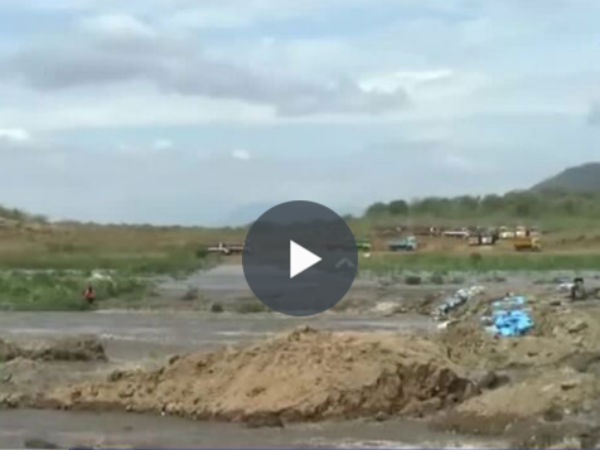 Lorry drivers locked in Mayaru flood in sathyamangalam Lorry drivers locked in Mayaru flood in sathyamangalam