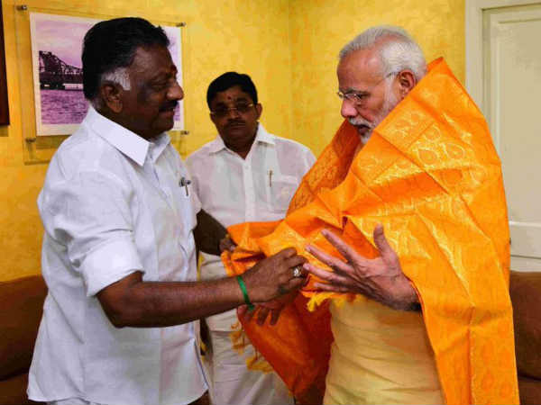 OPS meets PM Modi at Madurai Airport OPS meets PM Modi at Madurai Airport