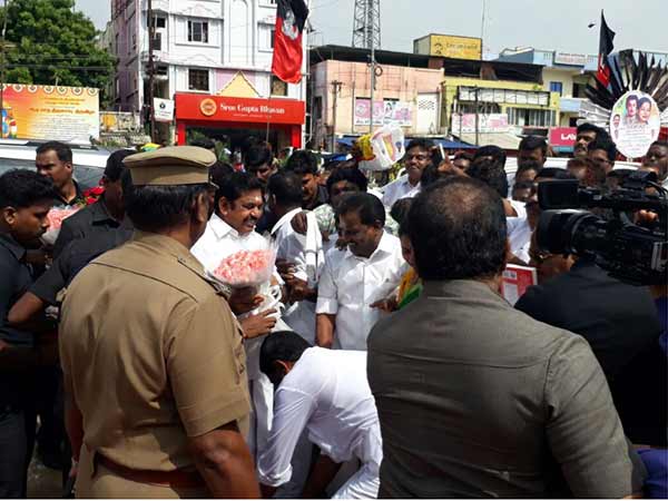 ADMK cadres fall in Edappadi's feet ADMK cadres fall in Edappadi's feet