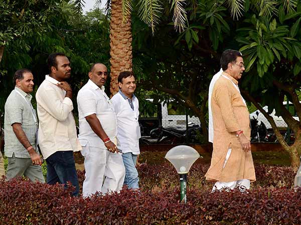 Guj MLAs arrive at Ahmedabad amidst tight security Guj MLAs arrive at Ahmedabad amidst tight security