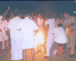 DMK cadres burning the effigy of Vedanthi