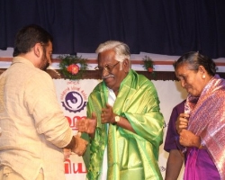 Kamal with Puviarasu and his wife