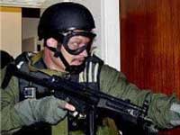NY homes raided in terror probe NY homes raided in terror probe