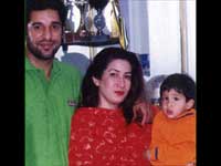 Wasim with wife and child Wasim with wife and child