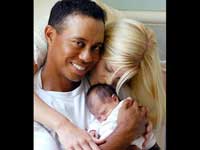Woods with wife and child Woods with wife and child