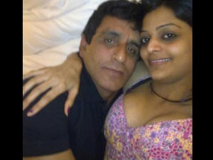 Umpire Asad Rauf with Model Leena Umpire Asad Rauf with Model Leena