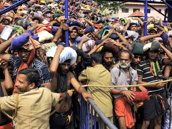 சபரிமலை பக்தர்களிடம் கனிவாக நடக்க வேண்டும்: போலீசாருக்கு கேரள ஹைகோர்ட் உத்தரவு
