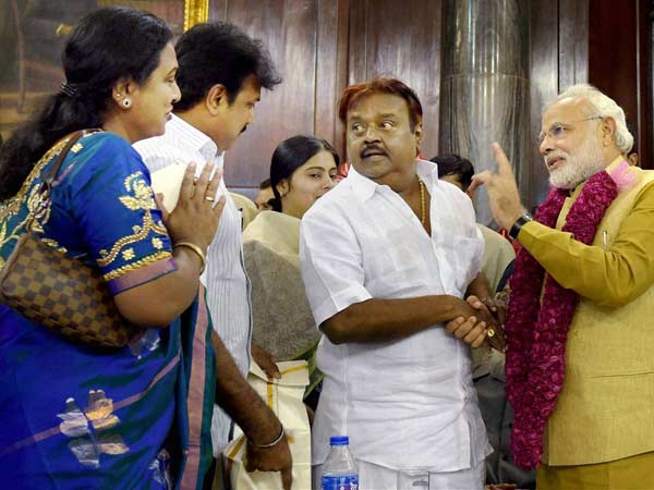 Vijayakanth greet Modi with family Vijayakanth greet Modi with family