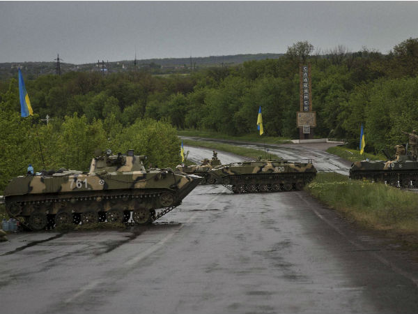 Ukraine forces fight to control site of plane crash Ukraine forces fight to control site of plane crash
