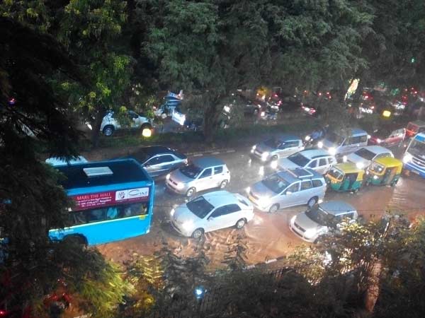 Bangalore: Rainfall floods roads, houses, uproots trees Bangalore: Rainfall floods roads, houses, uproots trees
