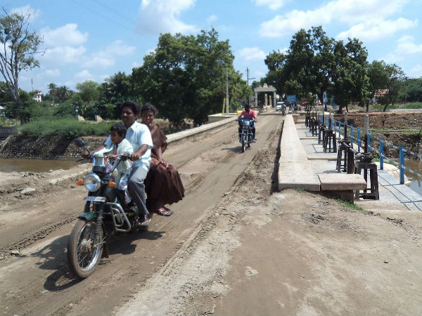 Karur bridge faces danger from sand ladden lorries Karur bridge faces danger from sand ladden lorries