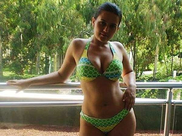 Busted! Young female judge blasted for posting skimpy bikini picture on Twitter Busted! Young female judge blasted for posting skimpy bikini picture on Twitter