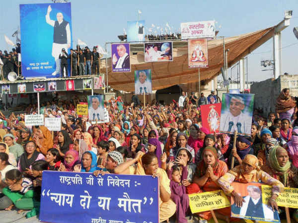 Police march up to ashram: UAVs sought to keep tabs on Rampal Police march up to ashram: UAVs sought to keep tabs on Rampal