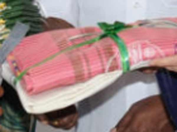Free dhotis and sarees from today Free dhotis and sarees from today
