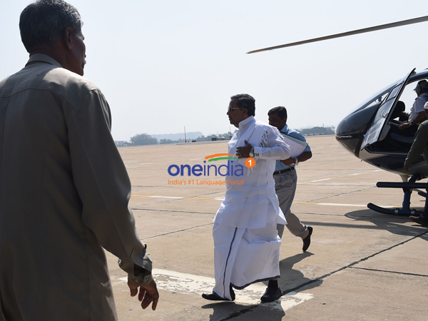Siddaramaiah unhurt after his chopper catches fire Siddaramaiah unhurt after his chopper catches fire