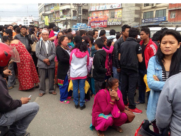 Nepal earthquake: Scared of aftershocks, people spend night outside singing, praying to God Nepal earthquake: Scared of aftershocks, people spend night outside singing, praying to God