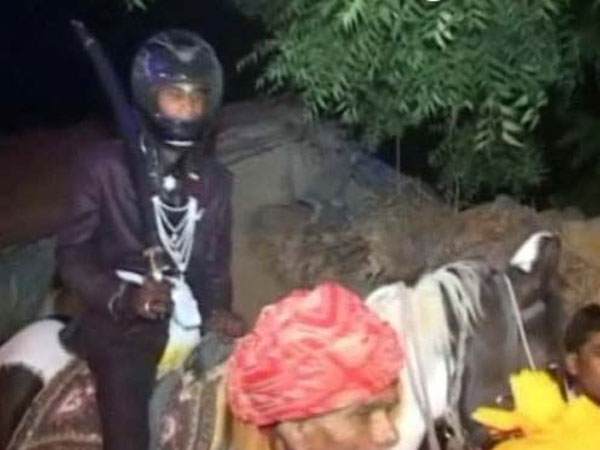 Dalit Groom Wears Helmet to Guard Against Upper Caste Villagers Dalit Groom Wears Helmet to Guard Against Upper Caste Villagers
