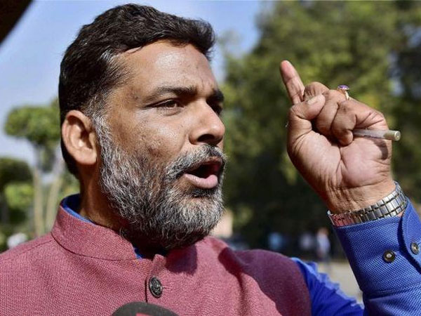 Expelled RJD MP Pappu Yadav misbehaves with airhostess onboard Jet Airways flight Expelled RJD MP Pappu Yadav misbehaves with airhostess onboard Jet Airways flight