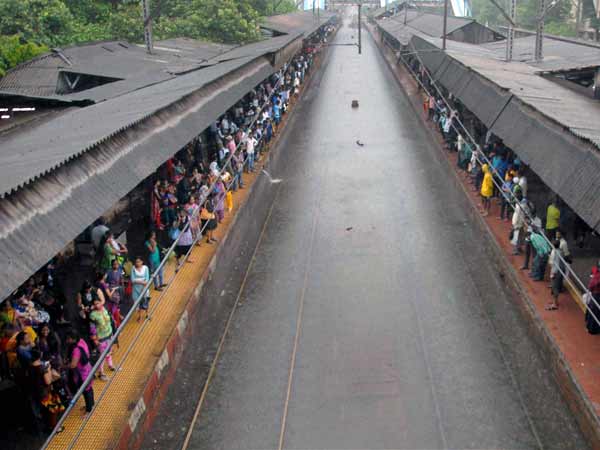 Mumbai back to work, train services restored Mumbai back to work, train services restored