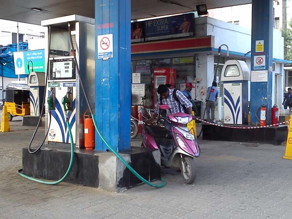 Petrol prices may drop below £1 a liter as Britain's biggest retailers cut prices Petrol prices may drop below £1 a liter as Britain's biggest retailers cut prices