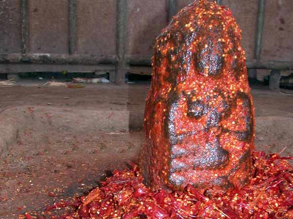 மிளகாய் பூசும் நீதிக் கல்