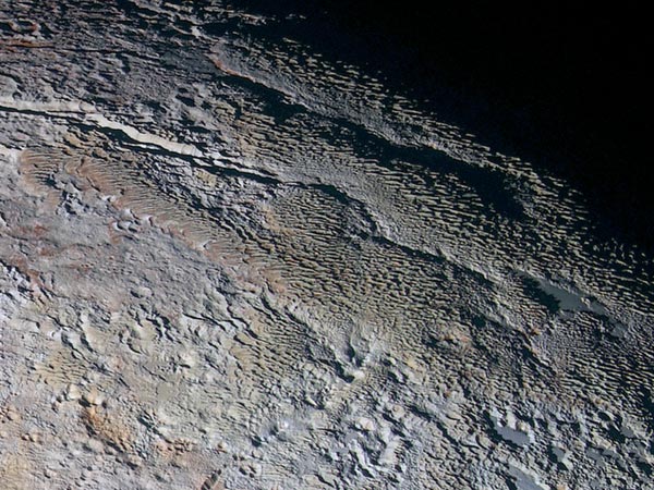 'Snake skin' photos reveal Pluto in dazzling details 'Snake skin' photos reveal Pluto in dazzling details