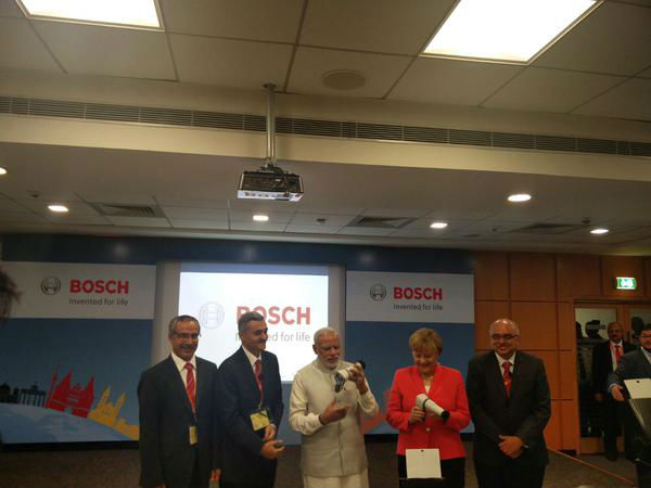 Modi, Merkel visit Bosch plant in Bangalore Modi, Merkel visit Bosch plant in Bangalore