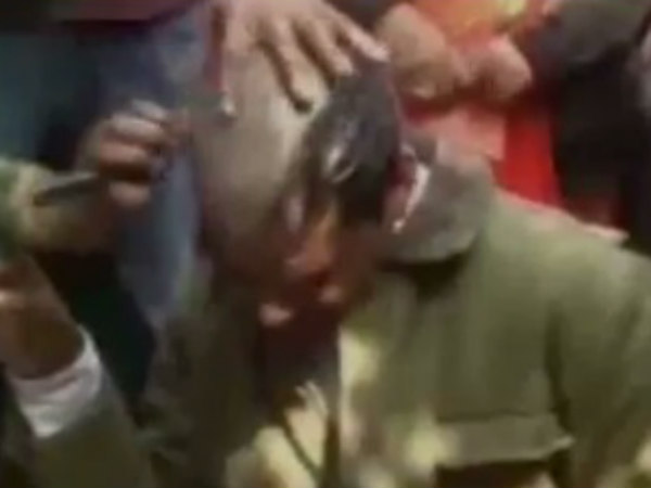 Bajrang Dal activists tonsure man for converting Hindus Bajrang Dal activists tonsure man for converting Hindus