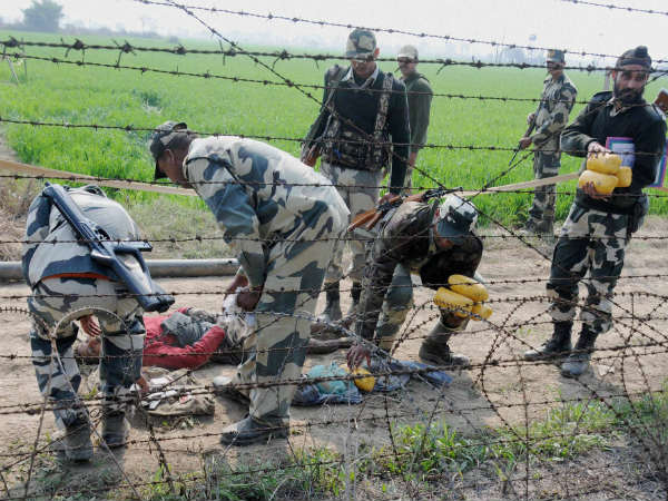 BSF guns down 4 smugglers near Pak border, recovers 10kg heroin BSF guns down 4 smugglers near Pak border, recovers 10kg heroin