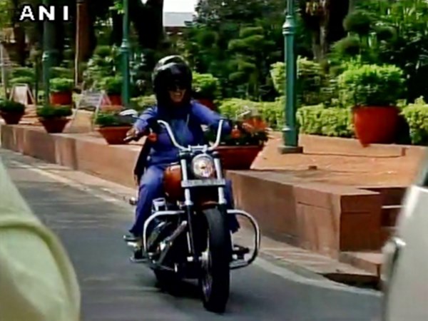 International Women's Day:Lady MP Rides on Motor bike(Harley Davidson) to Parliament International Women's Day:Lady MP Rides on Motor bike(Harley Davidson) to Parliament
