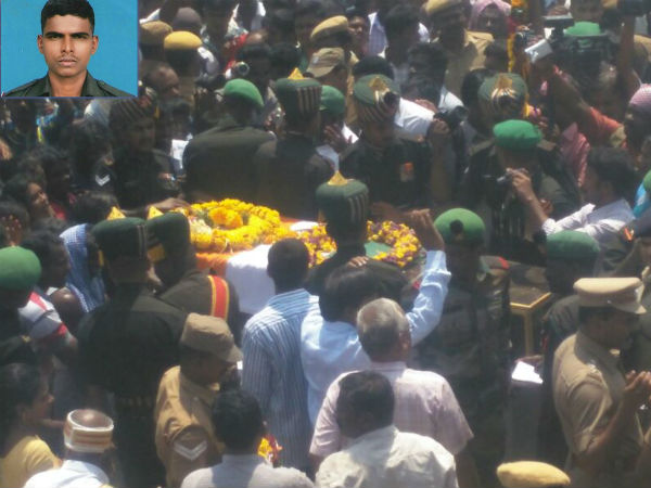 Army man Vijayakumar's body cremated with full honour Army man Vijayakumar's body cremated with full honour