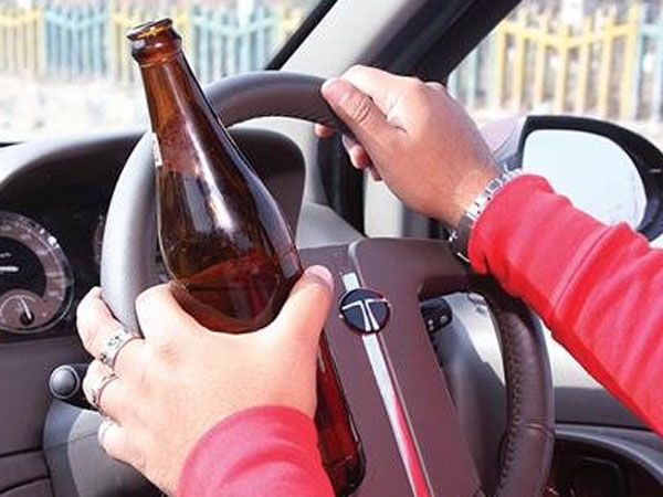 21-year-old drunk woman rams car into divider, bites six cops 21-year-old drunk woman rams car into divider, bites six cops