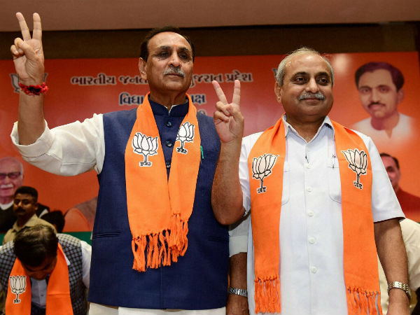 Vijay Rupani takes oath as Gujarat CM Vijay Rupani takes oath as Gujarat CM