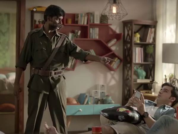 Chocolate advertisement portrays Veerappan as barbarian Chocolate advertisement portrays Veerappan as barbarian