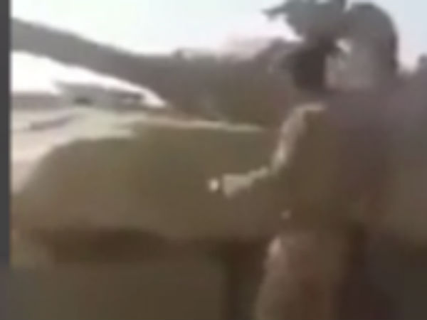 ISIS' brutal execution shows child crushed under tank ISIS' brutal execution shows child crushed under tank