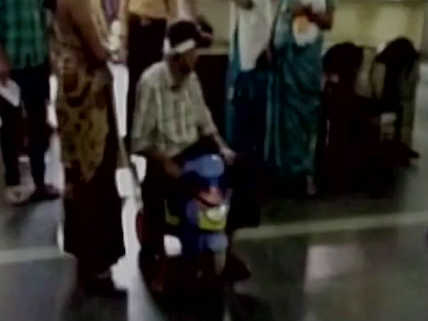 Patient forced to use child's tricycle to reach doctor's ward Patient forced to use child's tricycle to reach doctor's ward