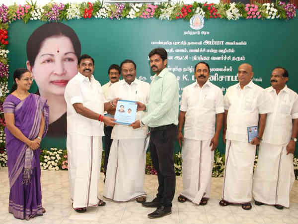TN CM gives 100 days schemes book to Stalin, guess who is he? TN CM gives 100 days schemes book to Stalin, guess who is he?