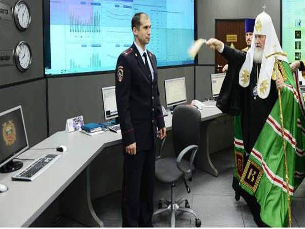 top priest blessing government computers with holy water top priest blessing government computers with holy water