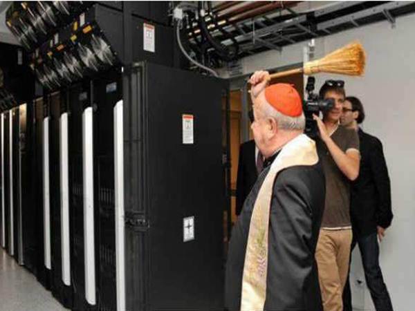 top priest blessing government computers with holy water top priest blessing government computers with holy water