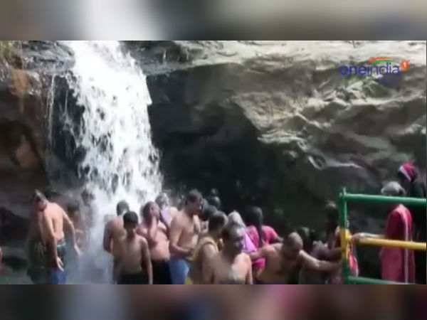 In Theni Kumbakarai water falls, water flows and people enjoying it In Theni Kumbakarai water falls, water flows and people enjoying it