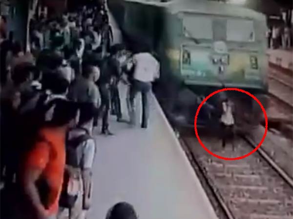 Video: Girl survives after being run over by a train in Mumbai Video: Girl survives after being run over by a train in Mumbai