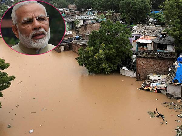 PM Modi takes stock of situation in flood-hit Gujarat PM Modi takes stock of situation in flood-hit Gujarat
