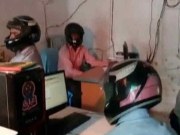 Employees Of This Bihar Government Office Wear Helmets To Work Employees Of This Bihar Government Office Wear Helmets To Work