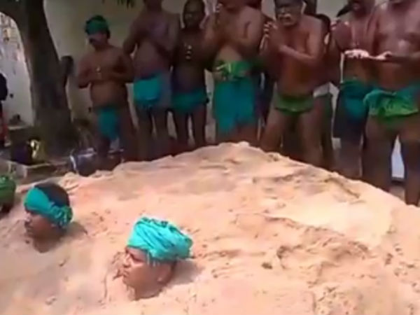 மணலில் புதைந்து போராட்டம்