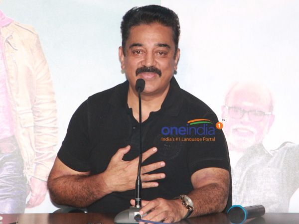 கண்களை மூடிய கமல்