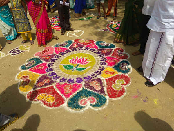 A rangoli which shows like Lotus and two leaves are merged A rangoli which shows like Lotus and two leaves are merged