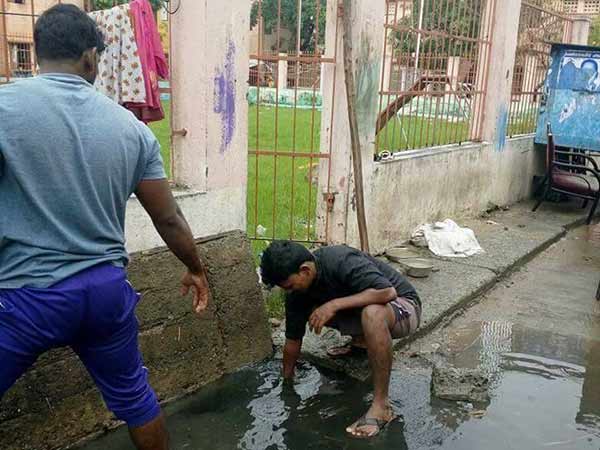 Naam tamizhar party cadres involving themselves in rain resue operations Naam tamizhar party cadres involving themselves in rain resue operations