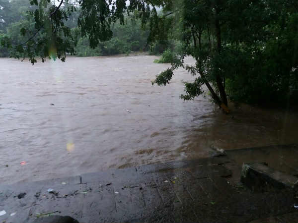Three people drained in the flood with two wheelor at Thamirabharani river Three people drained in the flood with two wheelor at Thamirabharani river